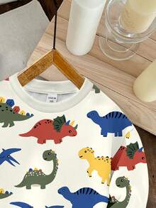 SHEIN 年轻男孩休闲简约卡通恐龙印花宽松圆领舒适针织长袖运动衫，适合秋冬季