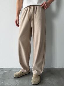 HUEFORM 男士卡其色成熟宽松休闲裤，面料挺括，剪裁利落。适合户外活动和居家休闲穿着。 - 卡其色 - 查看 6