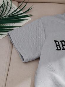 两件套针织华夫格纹理半拉链前开襟刺绣英文文字短袖上衣和短裤，时尚休闲日常穿着