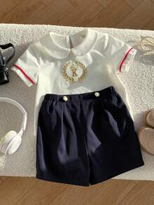 SHEIN 2pcs Baby Boy Preppy Style Embroidered Pattern Peter Pan Collar Short Sleeve Shirt & Elastic Waist Shorts Gentleman Outfit Set, Suitable For Birthday Party, Rave, Evening Party, Performance, Wedding, Baby Shower, And 1st Birthday Celebration Baby Boy Summer Outfit Baby Boy Casual Shorts Baby Boy Sailor Outfit Baby Boy Short Sleeve Set Baby Boy White Polo - Multicolor - View 4