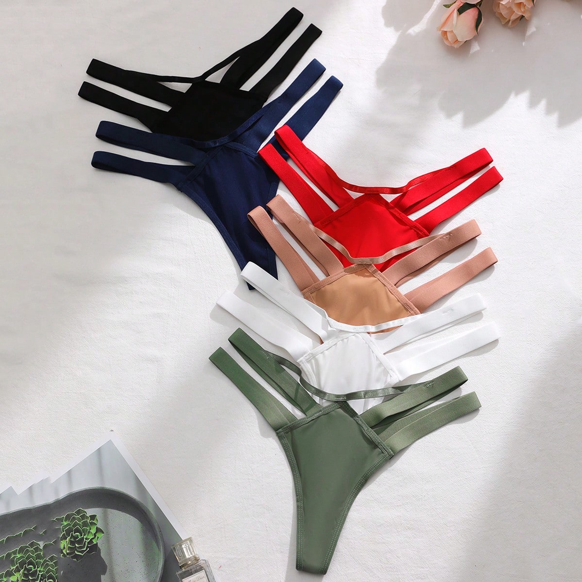 Piezas/paquete Bragas tipo tanga de unicolor y caladas para mujeres