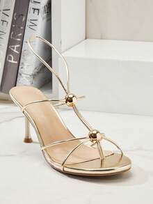 SHUZIA #GlamChic 女士金色珠饰绑带 3 英寸细高跟纯素皮革金色凉鞋 – 时尚、优雅、自信的现代宣言高跟鞋。 - 金色 - 查看 1