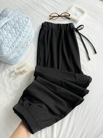 Pantaloni sportivi monocolore con coulisse in vita