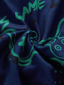 一套男童青少年睡衣，藏蓝色短袖彩色游戏手柄印花上衣搭配同款睡裤，时尚电竞风格，面料柔软透气，适合青少年游戏玩家穿着。 - 藏蓝色 - 查看 6