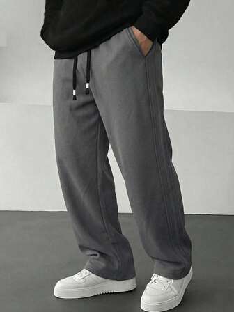 Manfinity Hypemode Men's Casual Solid Color Drawstring Loose Pants With Pockets