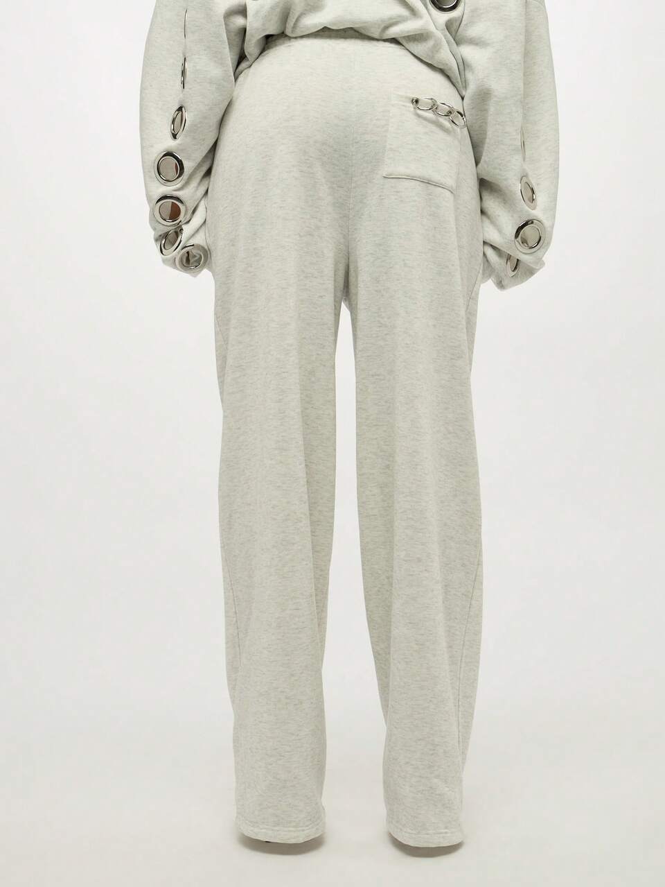 Pantalones deportivos con ojales metálicos de talla grande