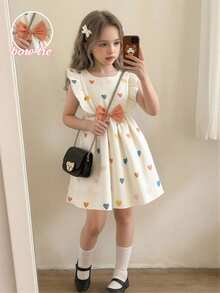 SHEIN Vintaside Kids Young Girl Heart Print Ruffle Hem Bow Accent Summer Dress