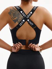 Rhythm Era 大码女士无缝纯色交叉字母肩带运动文胸 - 黑色 - 查看 1