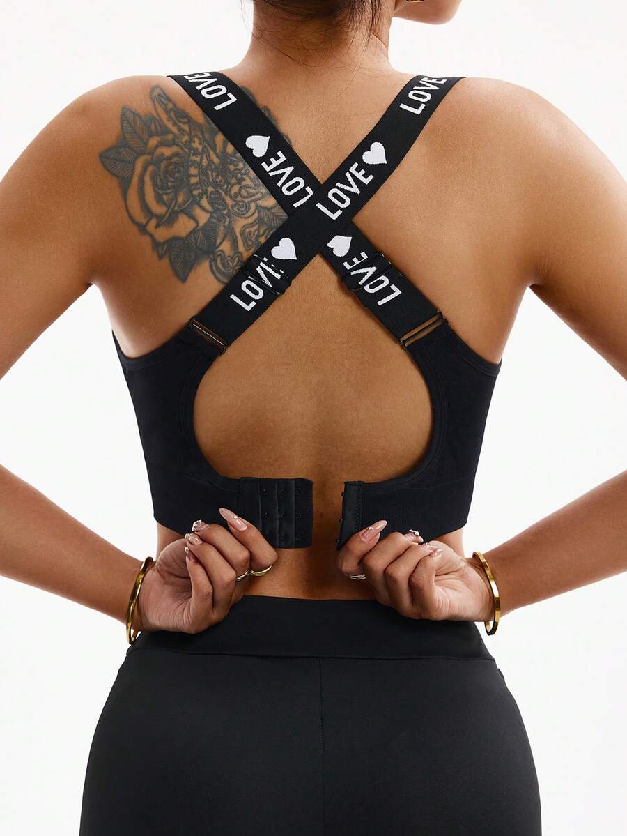 Rhythm Era 大码女士无缝纯色交叉字母肩带运动文胸 - 黑色 - 查看 1