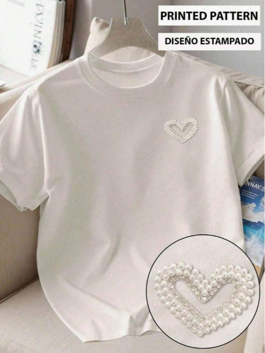 Camiseta de manga corta holgada de cuello redondo con gráfico de Corazon pequeño, perlas, camiseta informal de algodón mezclado para mujer - Blanco - Ver 1