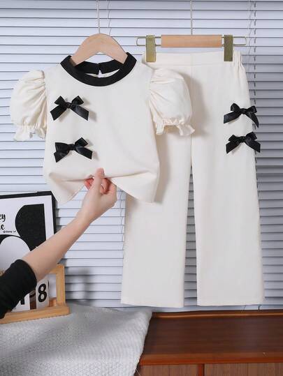 Genkimix Kids Young Girl Contrast Trim Round Neck Puff Sleeve Top With Bow Decor & Elastic Waist Pants Set Kids Pants Suit For Girls Two Piece Pants Set Kids 2pcs Set Toddler Girls Cute Vintage Style Bow Clothes Kids