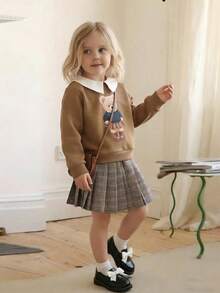 Playful Pals Conjunto informal para niñas de 2 en 1 con camisa de cuello, estampado frontal de diseño lindo, puño acanalado y sudadera con cintura elástica, falda plisada de cuadros vintage, para otoño/invierno - Caqui - Ver 5