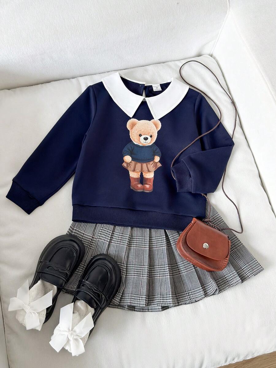 Playful Pals طقم بلوزة كاجوال وتنورة للفتيات الصغيرات، البلوزة بياقة قميص ثقيل وطباعة أمامية بنقشة جميلة وأساور مرنة، والتنورة بتصميم منقوش ملون وطيات في الذيل، مناسب للخريف والشتاء - أزرق غامق - مشاهدة 1