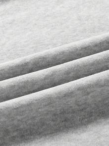 Manfinity 男士加大码落肩长袖休闲连帽衫，背面印有时尚图案