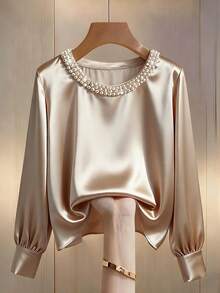 Franclia Áo thun nữ cỡ lớn, màu trơn, thanh lịch, cổ tròn, đính ngọc trai, tay phồng, phù hợp để mặc đi làm. - Màu be - Xem 1