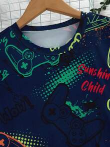 一套男童青少年睡衣，藏蓝色短袖彩色游戏手柄印花上衣搭配同款睡裤，时尚电竞风格，面料柔软透气，适合青少年游戏玩家穿着。 - 藏蓝色 - 查看 7