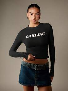 MISSGUIDED Long Sleeve Darling Slogan Baby Tee Fitted Crop Top Round Neck Letter Print Statement Shirt - Black - View 5