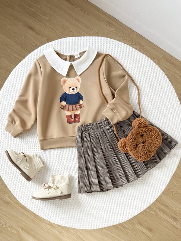 Playful Pals Conjunto informal para niñas de 2 en 1 con camisa de cuello, estampado frontal de diseño lindo, puño acanalado y sudadera con cintura elástica, falda plisada de cuadros vintage, para otoño/invierno