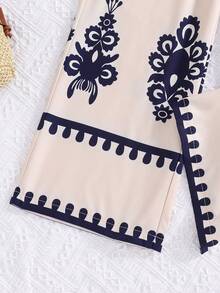 Sparklyn 这款女童两件套包括一件印花短袖无领上衣和一条宽松阔腿裤。非常适合女孩日常休闲穿着，也适合夏季假期穿着。 - 杏色 - 查看 4