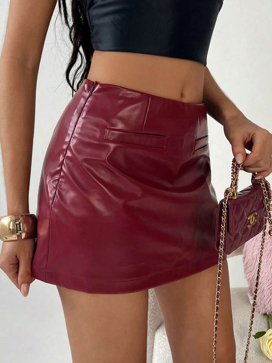 SHEIN TRNDY Women's Burgundy PU Leather Skirt, Burgundy Skort, Women's Bottoms, Women's Solid Color PU Fabric Faux Pocket Fashionable Mini Skirt, Women's Skirt, Women's Winter, Women's Autumn, Women's Winter, Christmas, Business Casual Women's Wear, Women's Office Attire - Burgundy - View 1