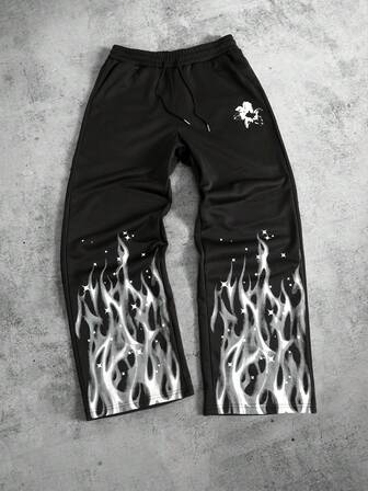 Pantalones de chándal holgados con cordón y estampado de llamas para hombre