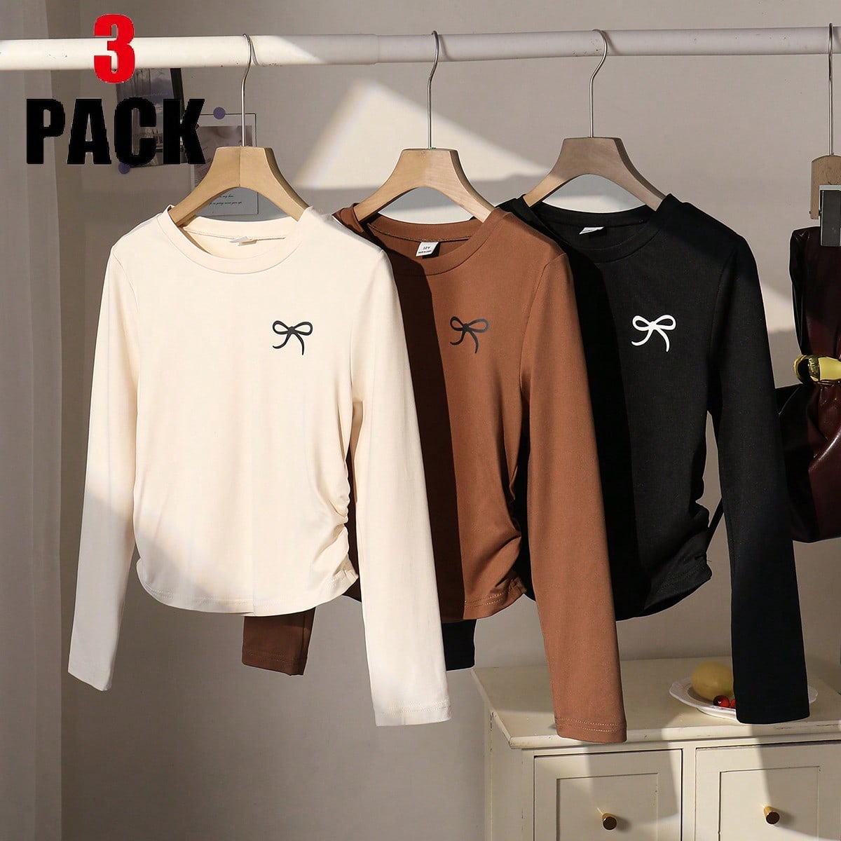 Piezas Camisetas ajustadas de manga larga con cuello redondo y gráfico de lazo para niñas, blusas casuales para uso diario, otoño