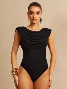 Silquee Este body sin mangas de malla elástica con cuello de chal y dobladillo con volantes, irradia un elegante y sexy estilo francés. Adecuado para citas, salidas, bodas, fiestas y diversas ocasiones, es una opción ideal para la primavera y el otoño. (Body de unicolor con escote en V profundo, de moda y versátil, adecuado para vacaciones y citas) - Negro - Ver 1