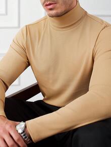 Core Aspect Maglietta a collo alto da uomo in tinta unita, slim fit, a maniche lunghe. Trasmette un'atmosfera casual di alta qualità, adatta per pendolarismo e uscite quotidiane. Il maglione a collo alto da uomo è un capo essenziale da indossare come strato intermedio in autunno e inverno, da abbinare a giacche, cappotti, cappotti di lana e giubbotti. Hanno una buona elasticità, design a tinta unita, versatili e pratici. - Cachi - Visualizzare 4