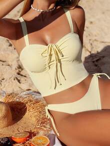 Swim Mod Bộ đồ bơi hai mảnh đơn giản, thoải mái dành cho nữ, thích hợp cho kỳ nghỉ hè, đi biển, du lịch, với áo hai dây màu trơn có dây rút nhún bèo và nơ, kết hợp với quần bikini buộc dây bên hông có thể điều chỉnh. Bộ đồ bơi hai mảnh này hoàn hảo cho các kỳ nghỉ biển, những chuyến đi nghỉ thu và nhiều dịp khác với phong cách nghỉ dưỡng. Bộ bikini hai mảnh màu vàng bơ, bộ đồ bơi hai mảnh mùa hè, áo bikini màu vàng nhạt. - Màu vàng - Xem 9