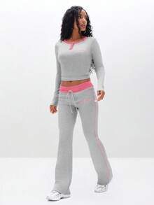 BABYPHAT Quần legging dệt kim gân với viền hồng tương phản, mang đến phong cách thoải mái thường ngày. - Xám - Xem 2