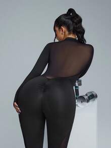 Innovista Woman Black High Stretch Long Sleeve Workout Jumpsuit With Full Back Mesh Panel Built-In Bra Removable Pads Zip Up Seamless Matching Mesh Construction Breathable Tummy Control Boosting Design For Yoga Pilates - Black - View 5