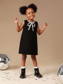 SUMWON Sleeveless A-Line Mini Dress With Embellished Bow Detail For Special Occasions - Black - View 1