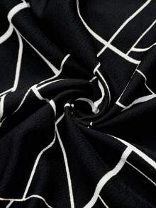 SHEIN Clasi Váy dài tay chữ A họa tiết hình học, váy màu đen tương phản, váy thu đông nữ - Đen và trắng - Xem 8