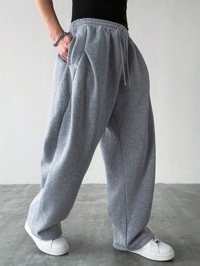 HUEFORM 男士休闲宽松运动裤，适合日常休闲穿着、周末外出、朋友聚会、旅行及其他轻松的社交活动。这款裤子是男士衣橱中不可或缺的百搭单品，也是送给男友或丈夫的绝佳礼物。男士灰色运动裤，阔腿运动裤，喇叭运动裤，灰色喇叭运动裤，长款运动裤