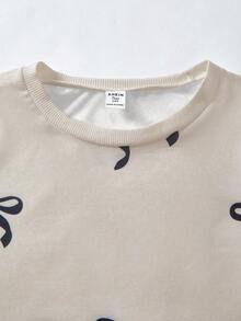 SHEIN 少女运动套装，秋冬新款，杏色数码印花卫衣配黑色蝴蝶结，黑色修身裤配白色蝴蝶结装饰，舒适合身 - 杏色 - 查看 8