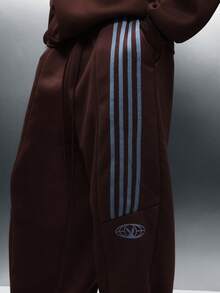 PLAYBOY X SUMWON Wide Leg Fleece Sweatpants With Side Stripes And Relaxed Fit For Casual Comfort And Everyday Wear - Brown - View 5