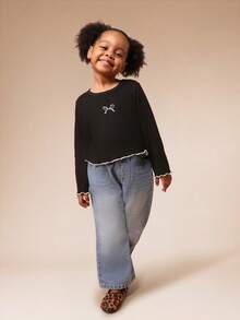 SUMWON Camiseta de manga larga con cuello redondo, bordado de lazo y dobladillo con volantes para niñas, para uso casual diario y vacaciones - Negro - Ver 3