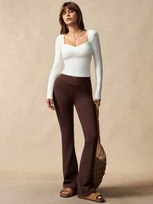 VARSIVA Damska koszulka sportowa z długim rękawem i odkrytymi plecami w jednolitym kolorze, z wiązaniem