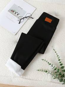 Quần legging giữ nhiệt cho bé gái tuổi teen - Màu đen. Quần legging giữ nhiệt màu đen cổ điển, chất liệu giữ nhiệt, cạp cao, dáng ôm. Phong cách mạng xã hội, cổ điển, thiết yếu cho kỳ nghỉ năm mới 2026, mùa thu đông, quần legging giữ nhiệt cho bé gái tuổi teen. - màu đen - Xem 1