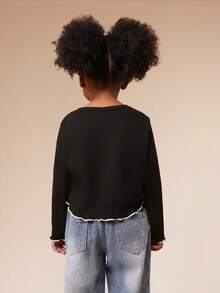 SUMWON Camiseta de manga larga con cuello redondo, bordado de lazo y dobladillo con volantes para niñas, para uso casual diario y vacaciones - Negro - Ver 2