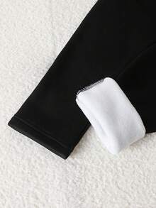 Quần legging giữ nhiệt cho bé gái tuổi teen - Màu đen. Quần legging giữ nhiệt màu đen cổ điển, chất liệu giữ nhiệt, cạp cao, dáng ôm. Phong cách mạng xã hội, cổ điển, thiết yếu cho kỳ nghỉ năm mới 2026, mùa thu đông, quần legging giữ nhiệt cho bé gái tuổi teen. - màu đen - Xem 4