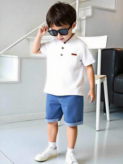 Souflis Souflis 2pcs/Set School Young Boy Outfit, Includes White Collared Short Sleeve Shirt With Brown Buttons & Chest Pockets, And Blue Cuffed Denim Shorts. Casual And Comfortable Outfit For Everyday Wear
