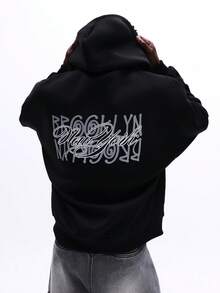 SUMWON 男士宽松黑色套头连帽衫，带中央口袋和抽绳帽，适合休闲冬季街头穿着 - 黑色 - 查看 1