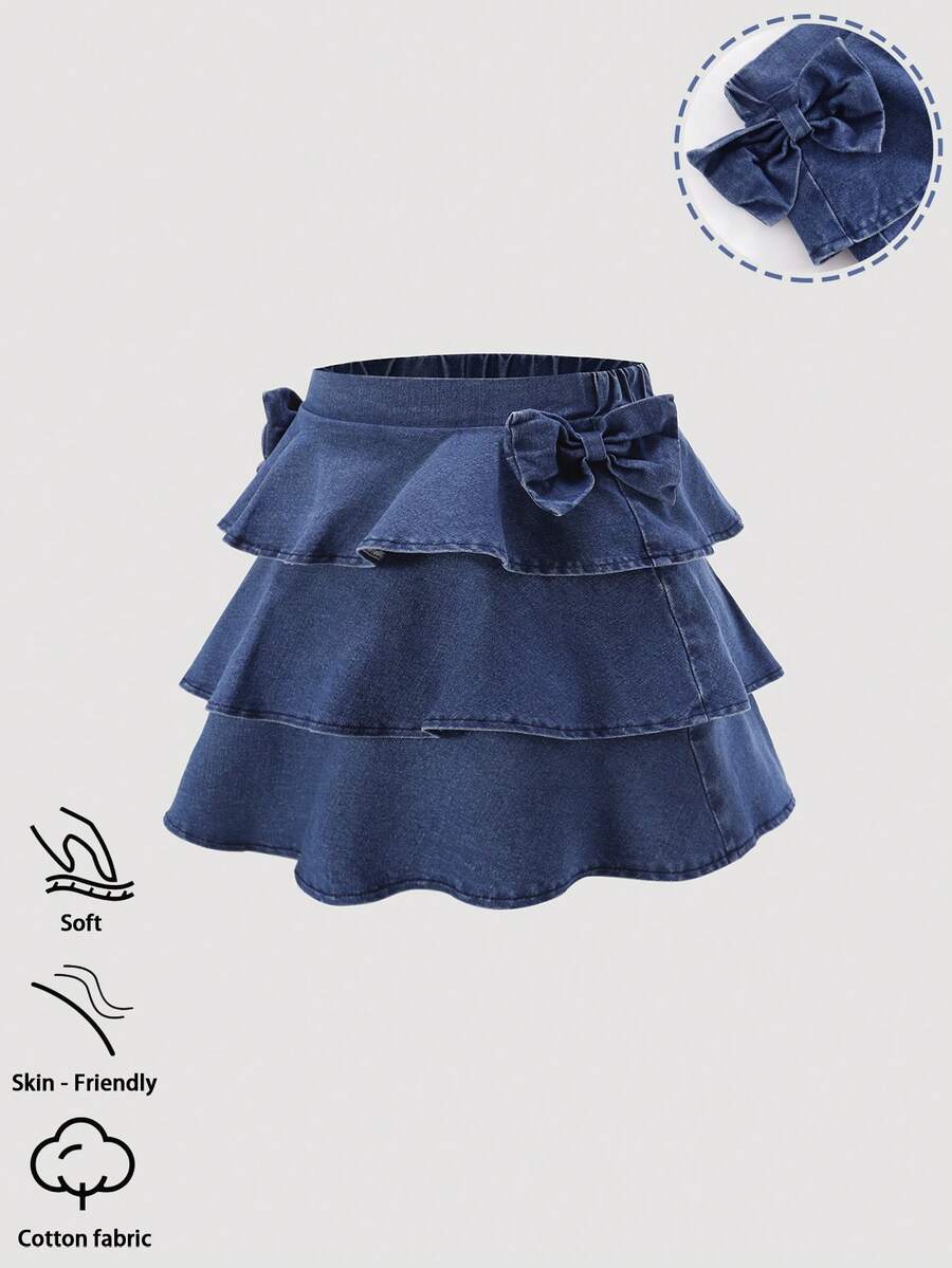 Modna, jeansowa mini spódniczka w stylu Sweet Cake dla nastolatek, odpowiednia na wiosnę, lato, jesień i zimę. Średnio sprany denim w kolorze niebieskim, modny styl uliczny Y2K, uroczy i uroczy wzór, warstwowy, falbaniasty dół z kokardką, elastyczny pas, miękka i elastyczna bawełna z efektem denimu, uniwersalna na co dzień, na imprezę, do szkoły i do pracy. Nowość na jesień/zimę. - Średni jeans - Zobacz 1