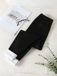 Quần legging giữ nhiệt cho bé gái tuổi teen - Màu đen. Quần legging giữ nhiệt màu đen cổ điển, chất liệu giữ nhiệt, cạp cao, dáng ôm. Phong cách mạng xã hội, cổ điển, thiết yếu cho kỳ nghỉ năm mới 2026, mùa thu đông, quần legging giữ nhiệt cho bé gái tuổi teen. - màu đen - Xem 2