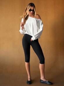 GLOWMODE 17" FeatherFit™ Crossover Waist Front Special Seam Cutie Capri Leggings Low Impact Yoga Studio Daily - Black - View 10