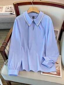 GlowEve CURVE Camicetta elegante e minimalista con collo alto e maniche lunghe, adatta per l'uso quotidiano e per appuntamenti, raffinata e graziosa, disponibile in taglie comode - Blu - Visualizzare 1