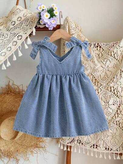 SHEIN Vintaside Kids Vestido sin mangas de estilo campestre para niña, vestido azul claro lavado con decoración de lazo desmontable, lindo y juguetón para salidas diarias, reuniones casuales, fiestas, un toque encantador de color en primavera y otoño
