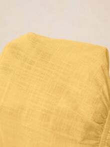 Poéselle Áo sơ mi nữ màu trơn cổ chữ V, vai thẳng, tay dài, thắt eo xếp ly, vạt áo nhún bèo. - Màu vàng - Xem 9