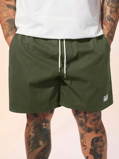 EASEVO Pantalones cortos casuales de talla grande para hombres con bolsillo y cordón en la cintura con diseño gráfico de letras